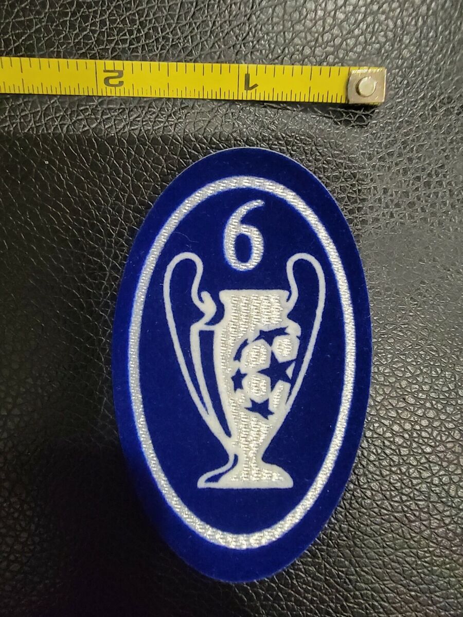 Is the uefa champions league 6 times trophy badge 2000-2012 valuable? Understanding its significance for fans.