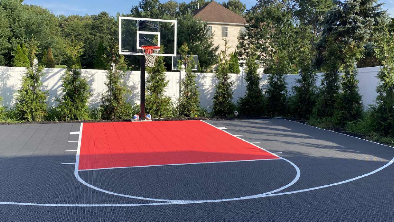 How much would a basketball court cost for real? We break down everything from basic to custom courts.