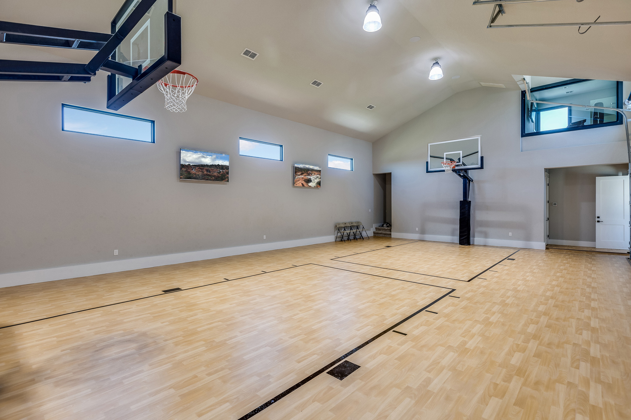How much would a basketball court cost for real? We break down everything from basic to custom courts.
